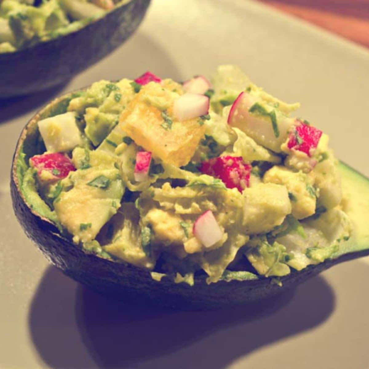 Guacamole with radish and oranges Featured