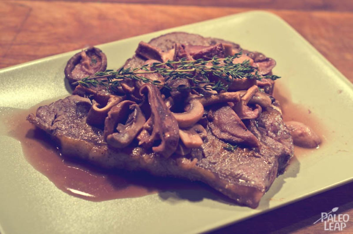 Steaks with mushrooms and red wine reduction