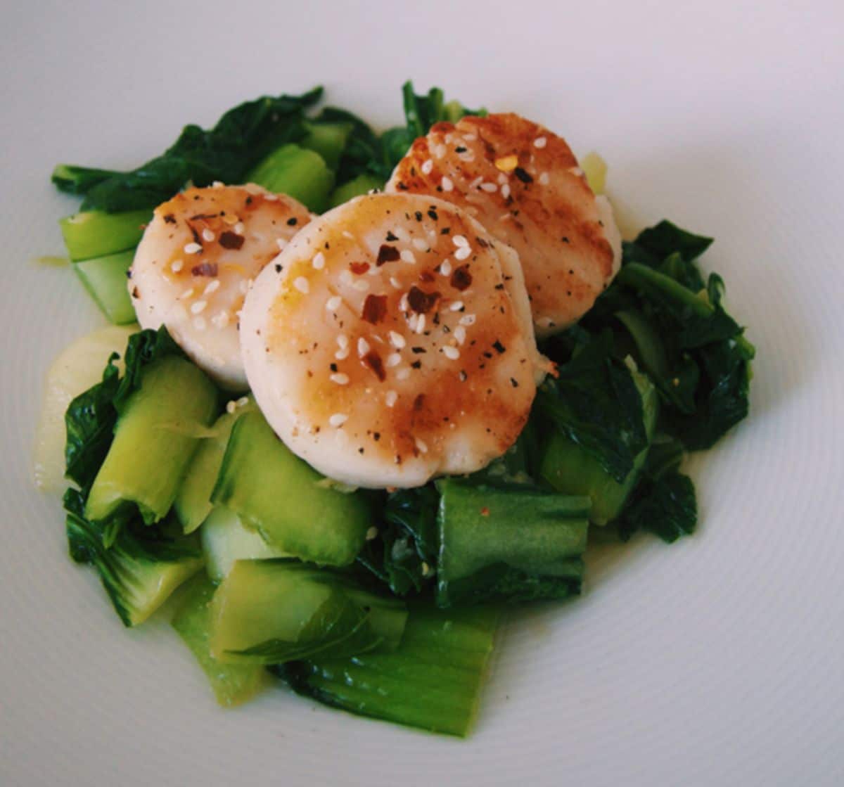 Seared scallops with asian sesame greens