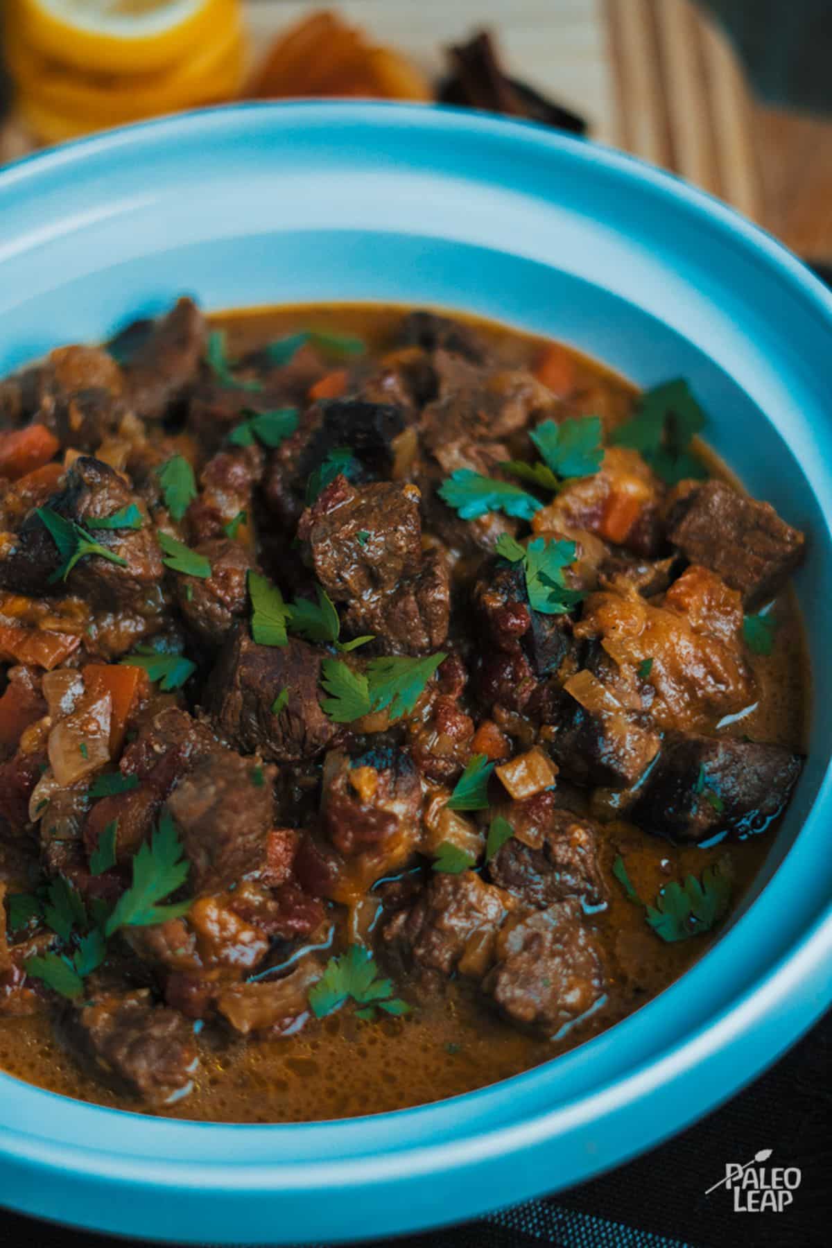 Slow Cooker Moroccan Lamb Stew in a blue bowl.