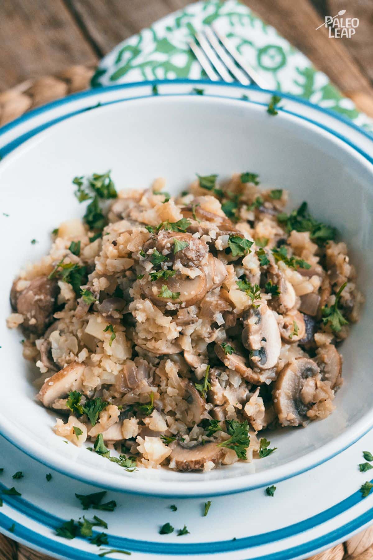 Cauliflower Mushroom Risotto in a white bowl.