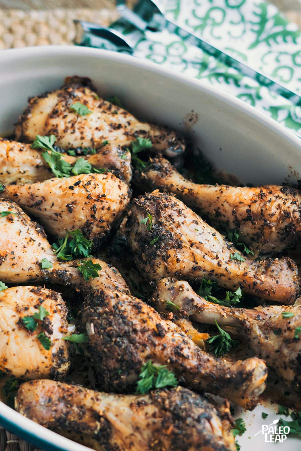 Roasted Dried Herb Drumsticks in a white bowl.