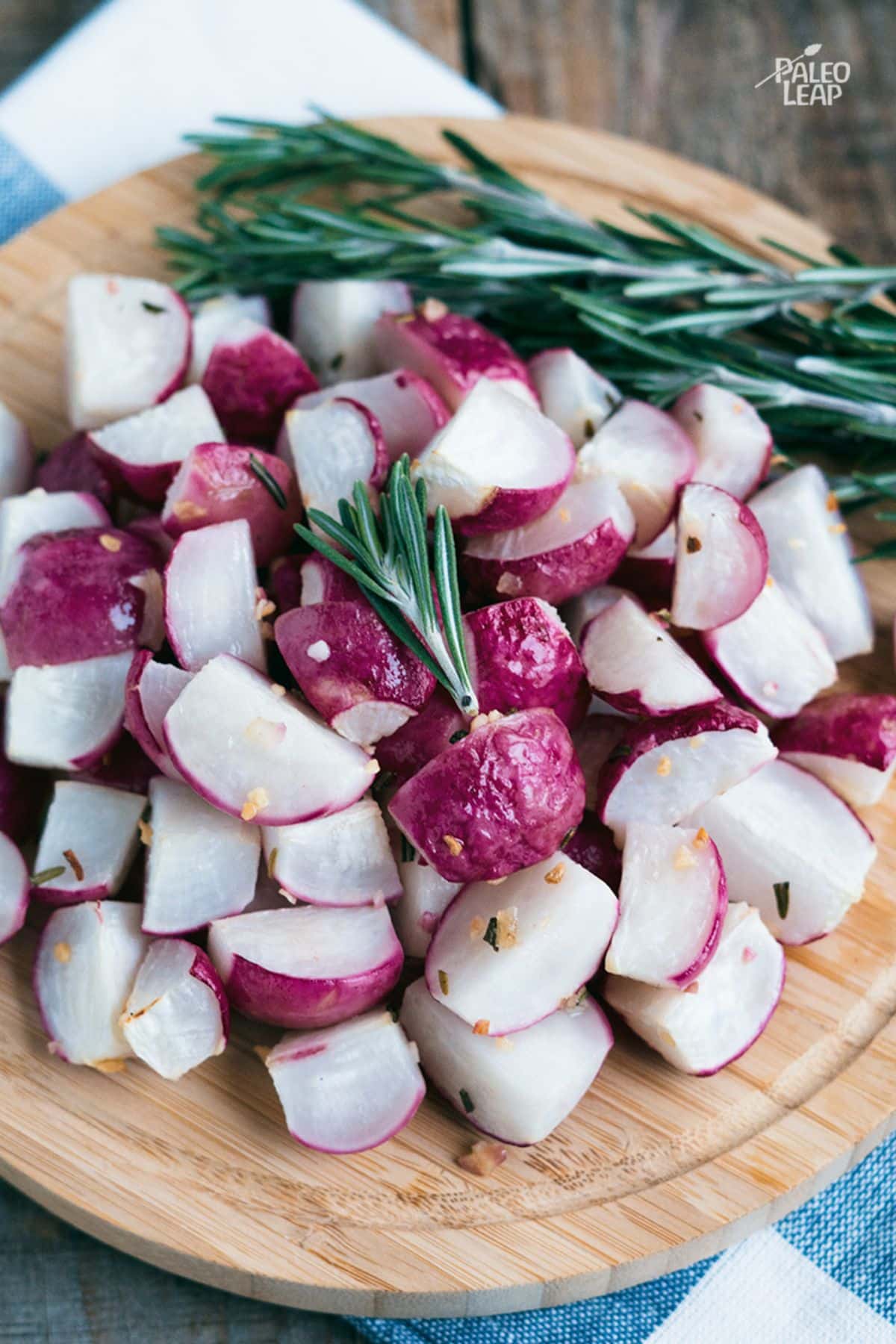 Roasted Rosemary Radishes on a wooden tray.