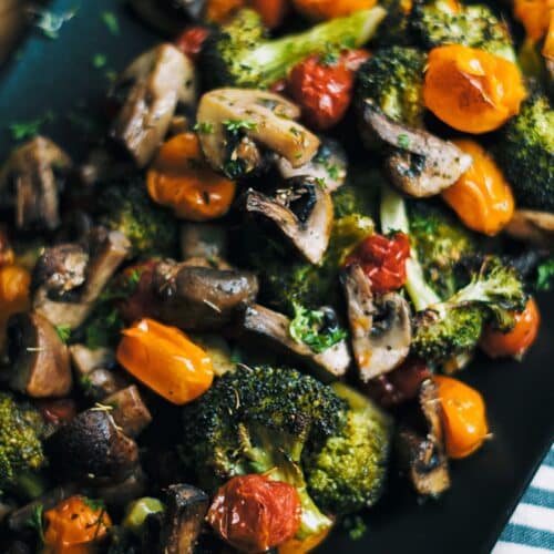 Roasted Vegetables With Italian Herbs on a baking tray.