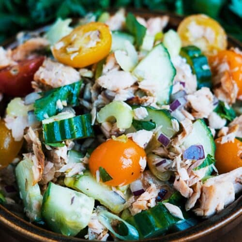 Keto Salmon Chopped Vegetable Salad in a brown bowl.
