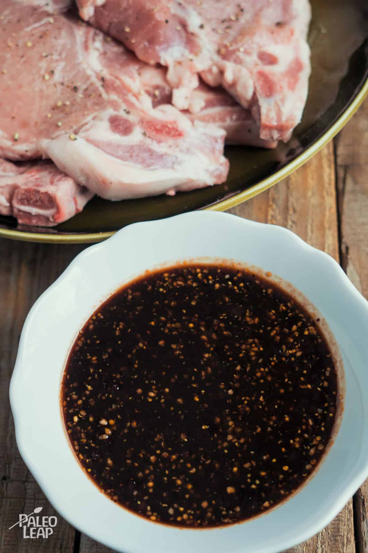 Pork Chops With Blackberry BBQ Sauce preparation.