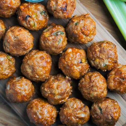 Keto Buffalo Chicken Meatballs on a wooden cutting board.