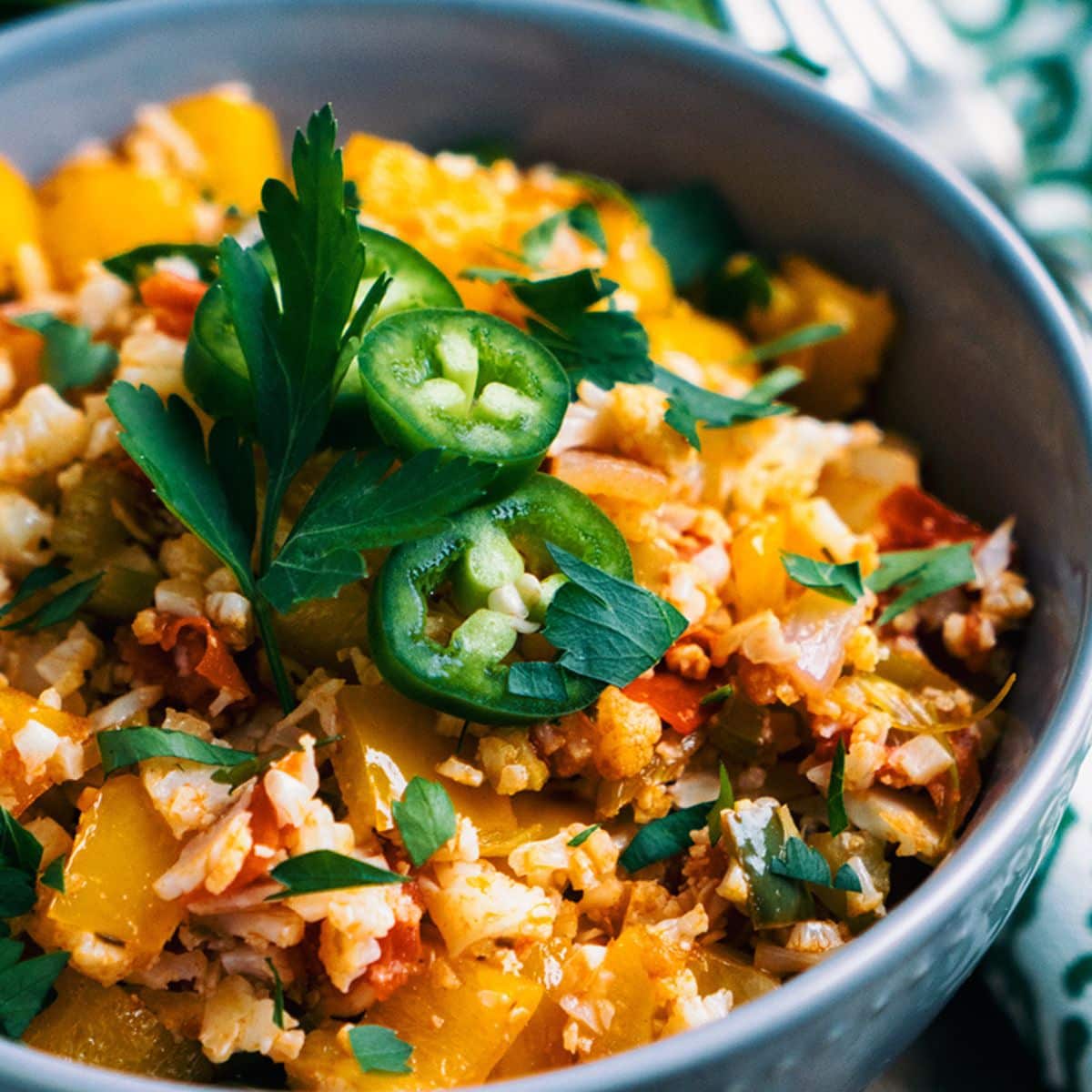 Southwest-Style Vegetable Cauliflower Rice in a blue bowl.