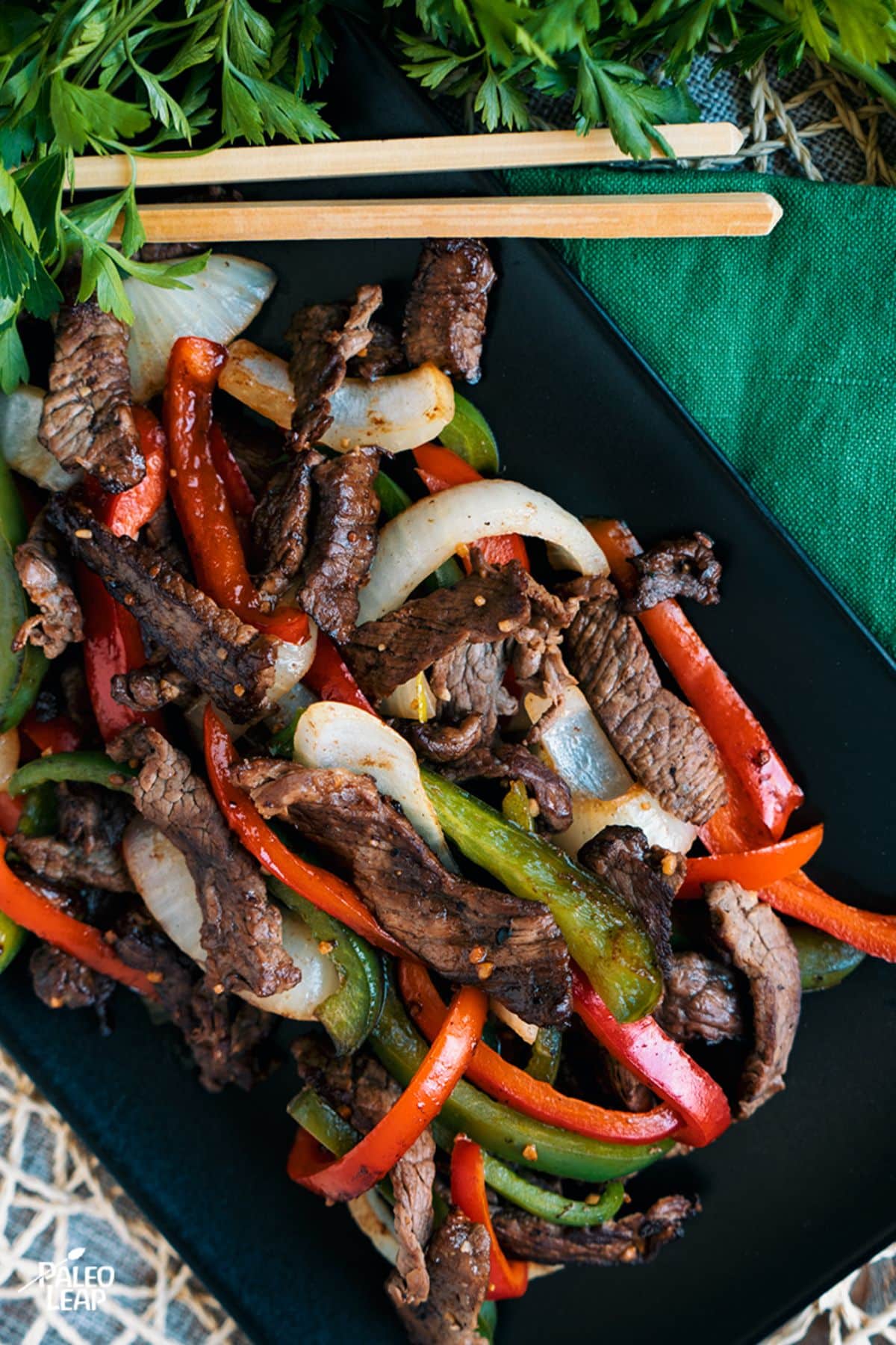 Steak And Pepper Skillet on a black tray.