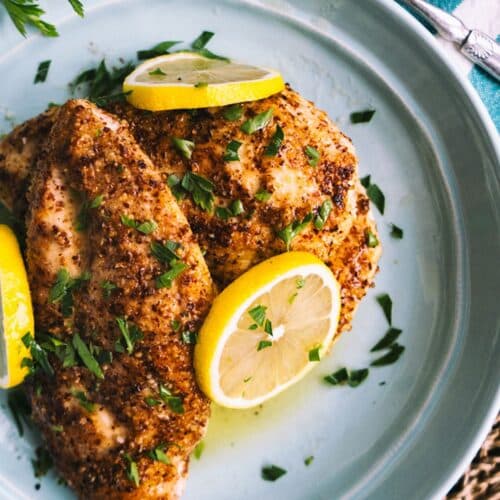 Lemon Pepper Chicken on a blue plate.