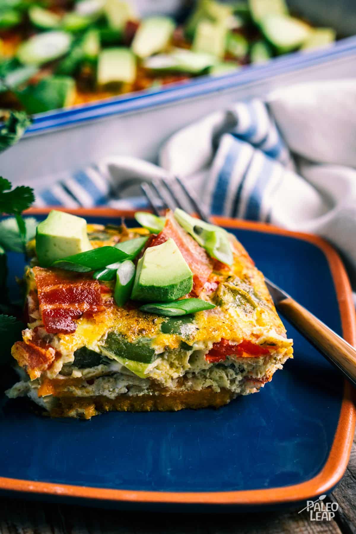 Mexican-Style Breakfast Lasagna on a plate with a fork.