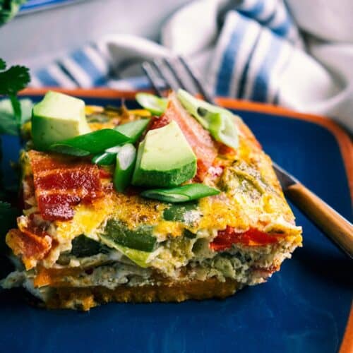 Mexican-Style Breakfast Lasagna on a plate with a fork.