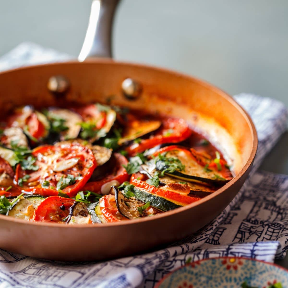 Eggplant, Zucchini, and Tomato Bake in a pan.