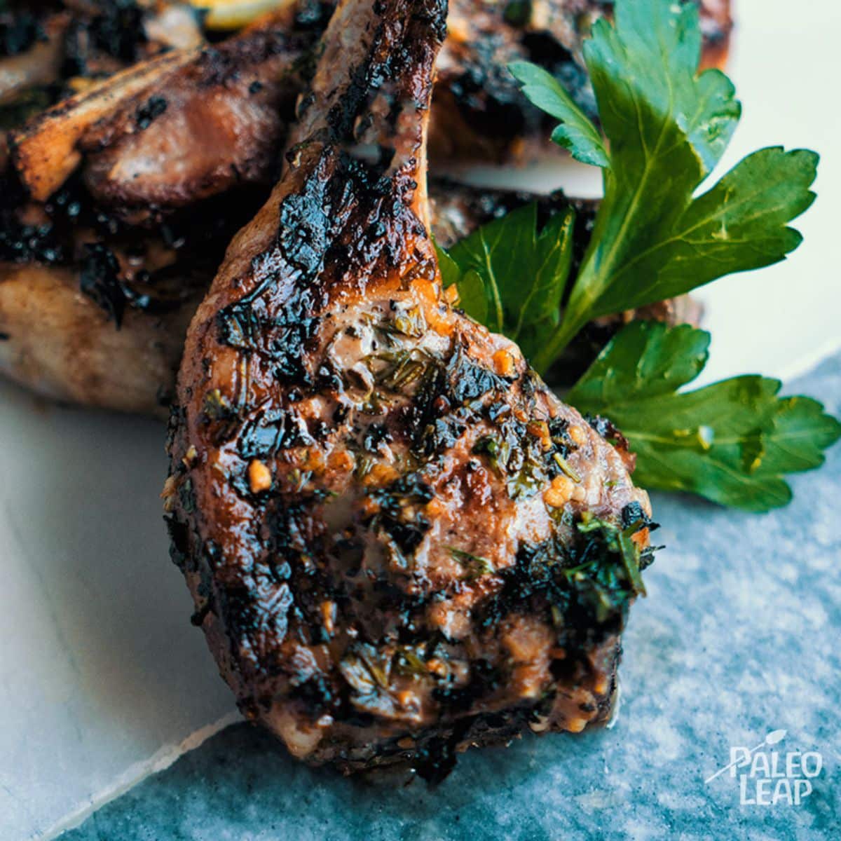 Garlic And Herb Lamb Chops on a table.