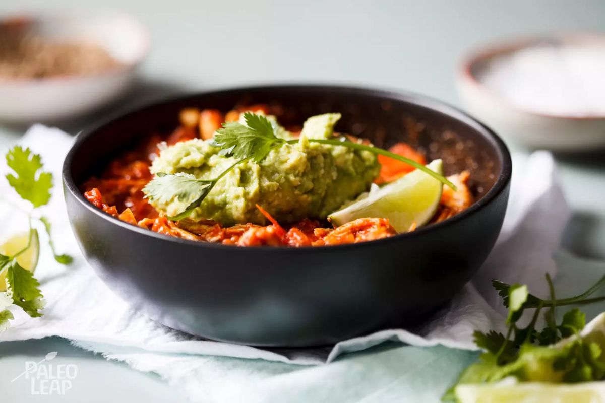 Shredded Chicken Chili in a black bowl.