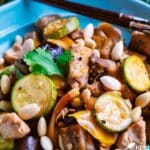 Keto Slow Cooker Kung-Pao Chicken in a blue bowl.
