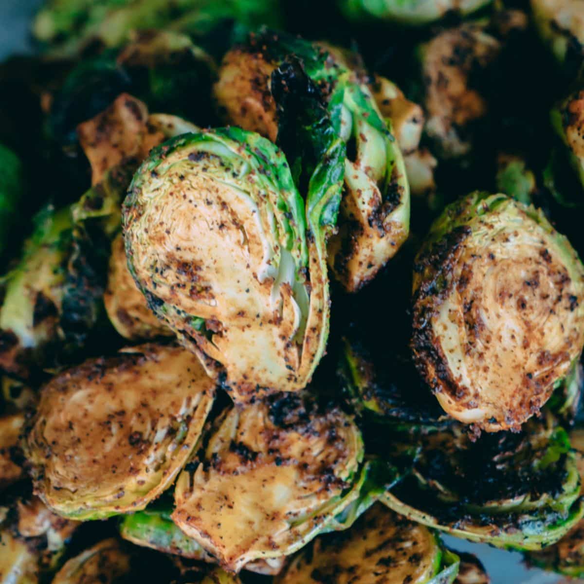 Grilled Paprika Brussels Sprouts on a plate.