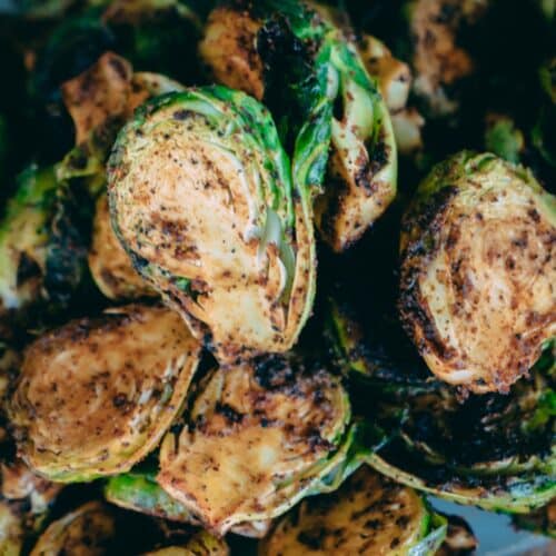 Grilled Paprika Brussels Sprouts on a plate.