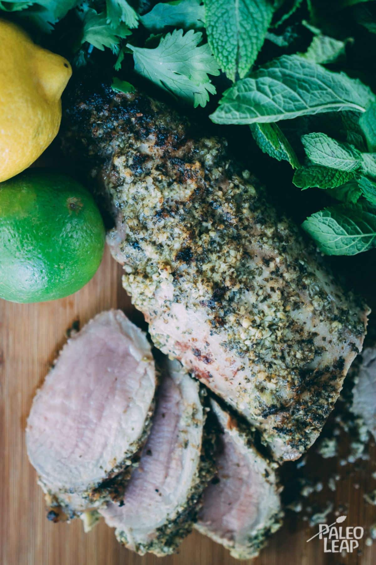 Grilled Cuban-Style Citrus Pork on a wooden board.