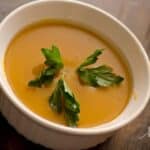 Slow Cooker Butternut Squash Soup in a white bowl.