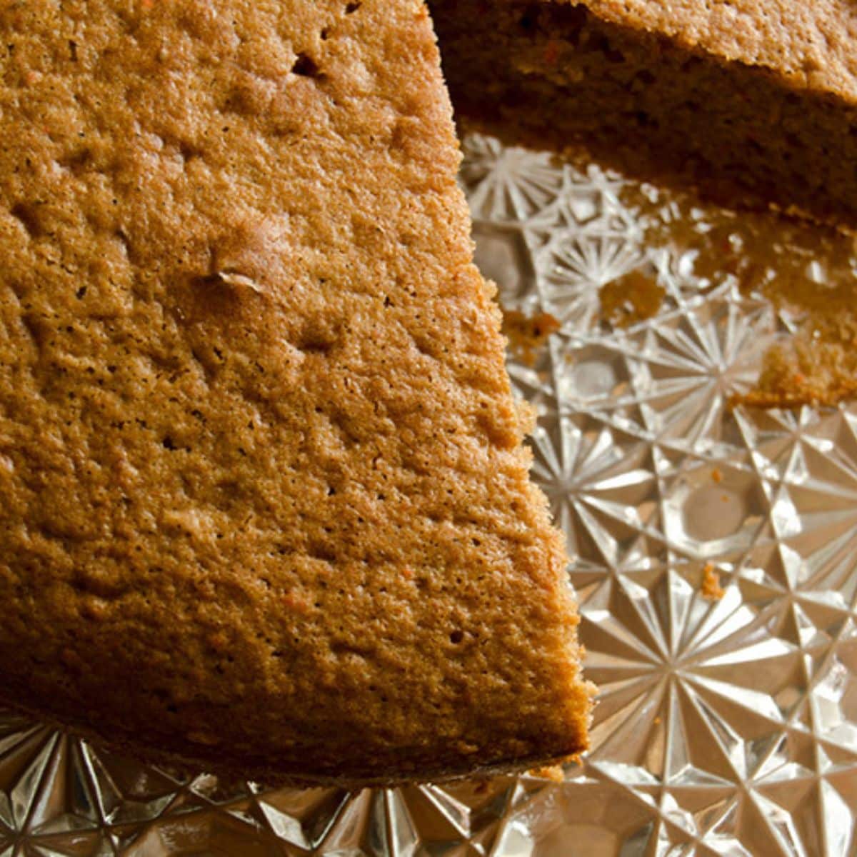 Paleo Orange Carrot Cake on a glass tray.