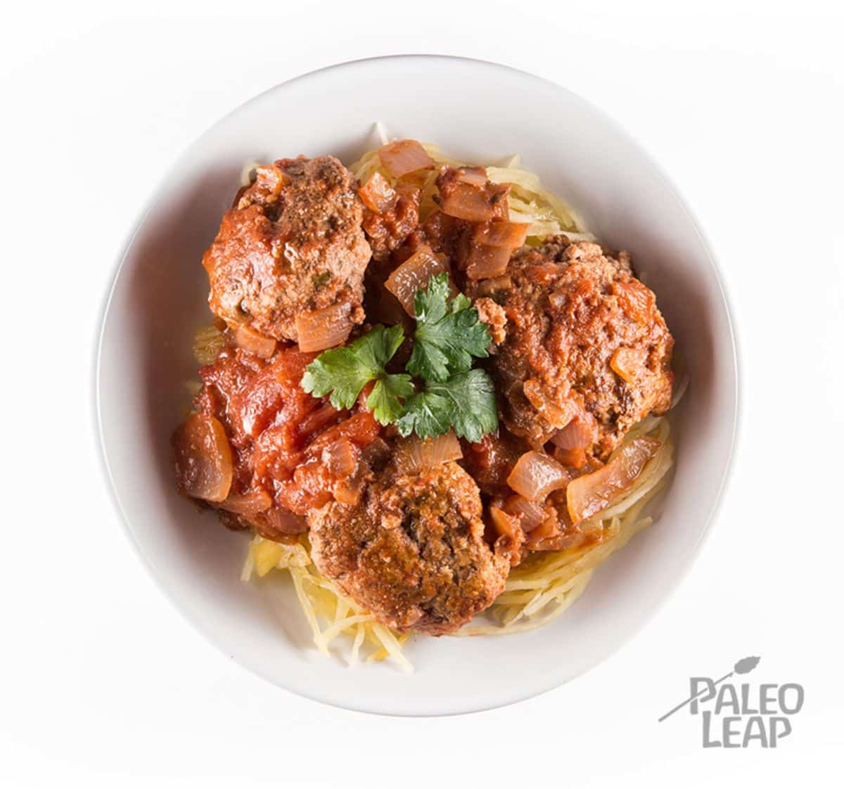 Paleo Spaghetti and Meatballs in a white bowl.