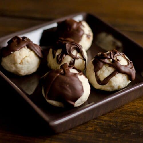 Paleo Dark Chocolate-Drizzled Shortbreads in a brown bowl.