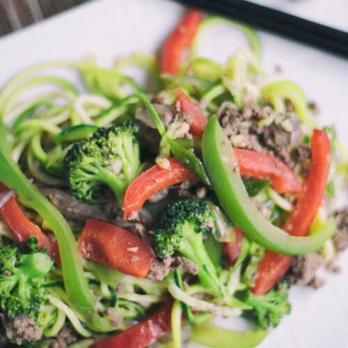 Ground Beef And Zucchini Stir-Fry on a white tray.