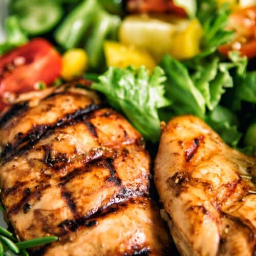 Balsamic Grilled Chicken With Greek-Style Salad on a white plate.