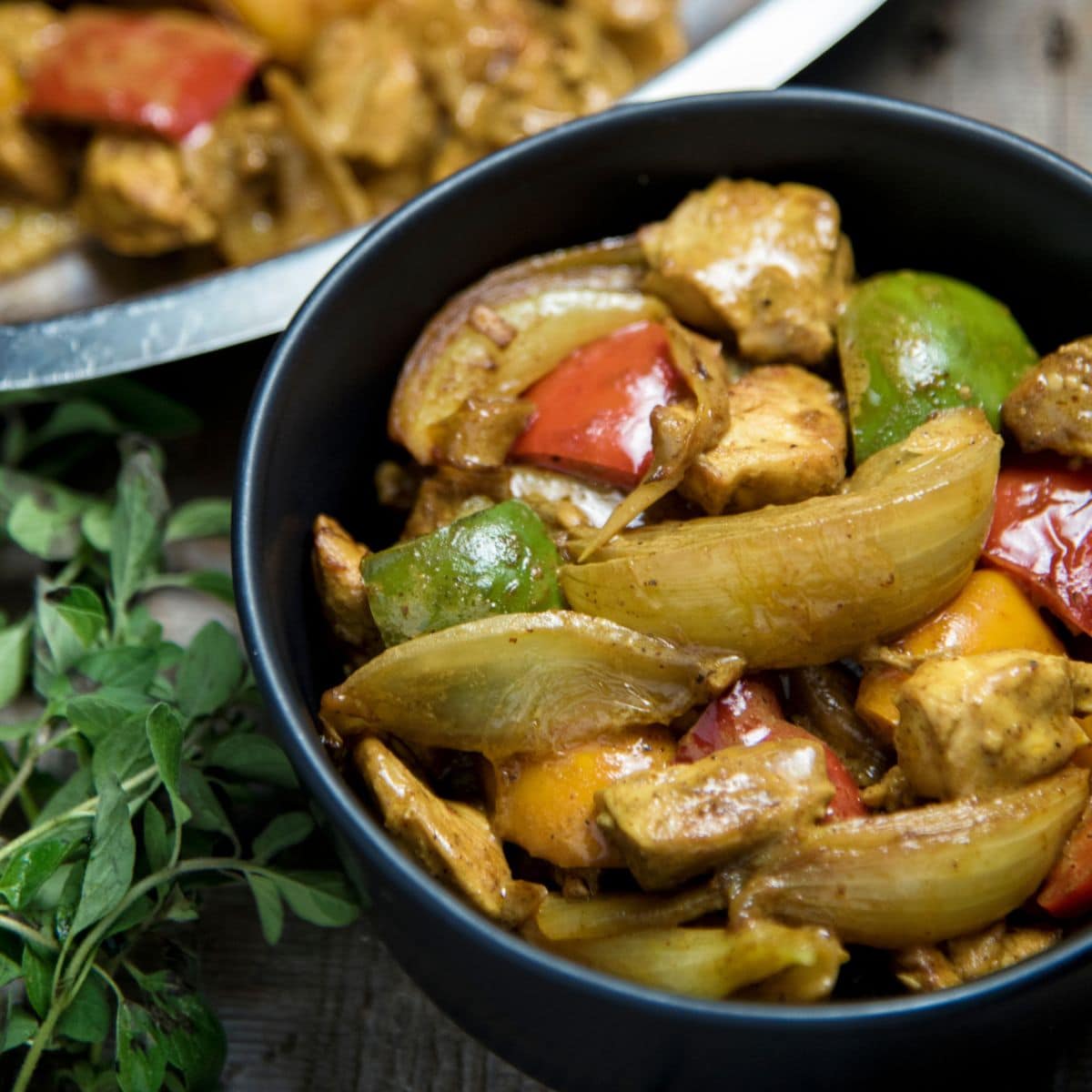 Chicken Curry With Coconut Milk in a black bowl.