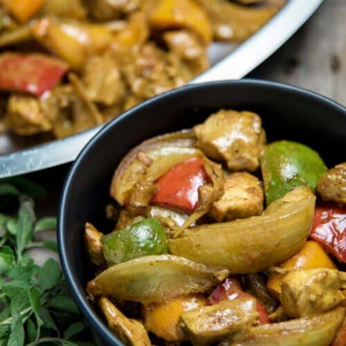 Chicken Curry With Coconut Milk in a black bowl.