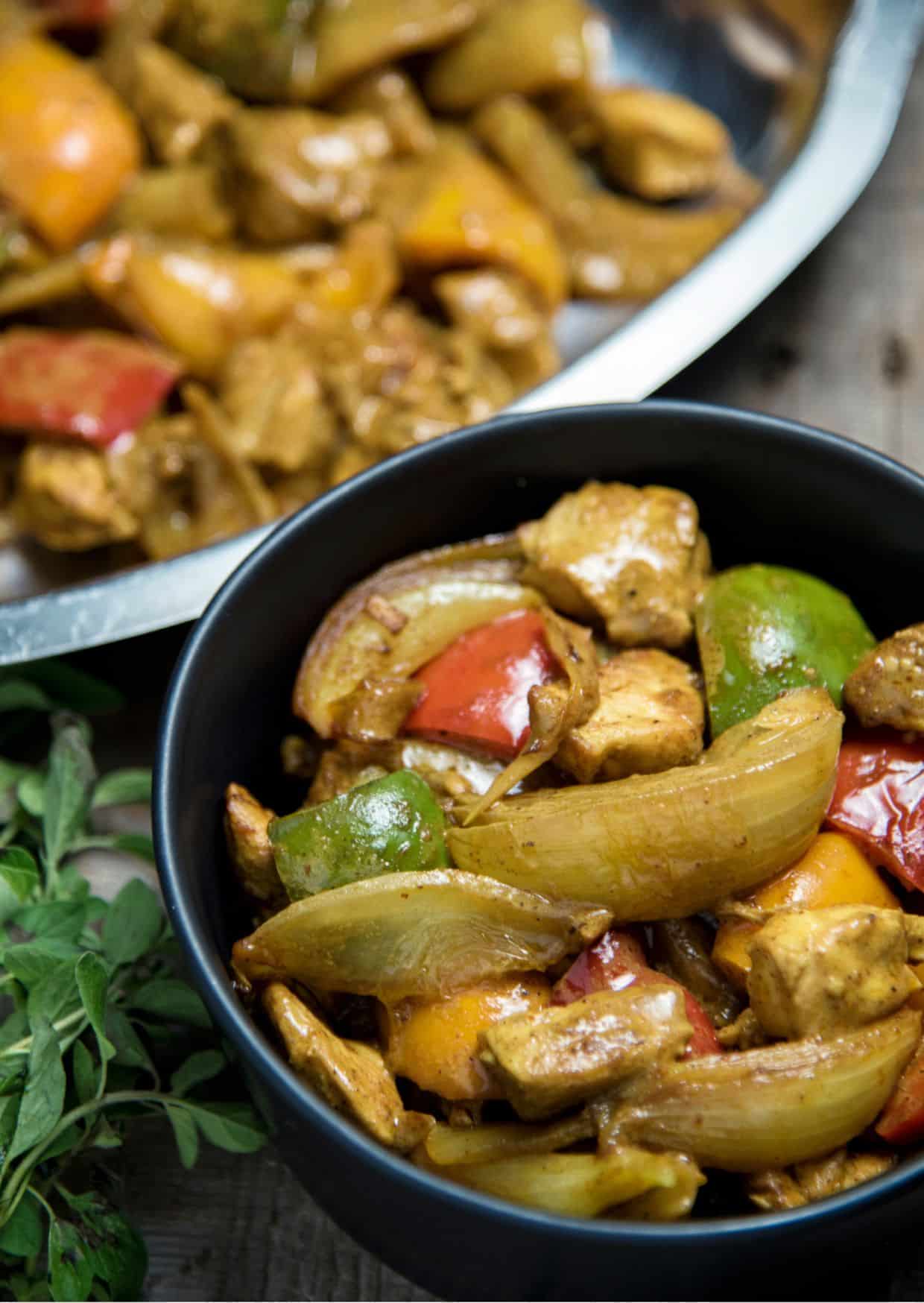 Chicken Curry With Coconut Milk in a black bowl.