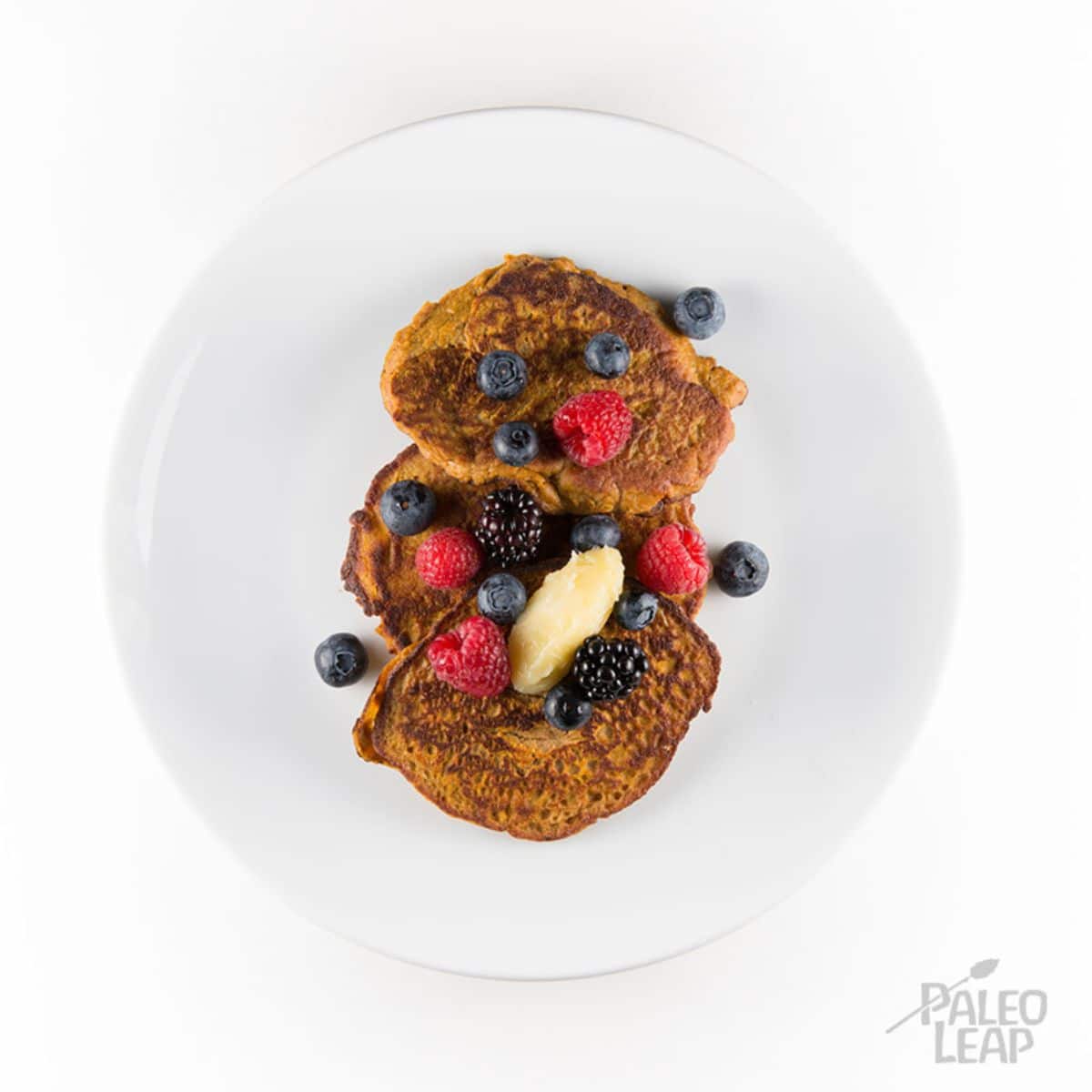 Paleo Pumpkin Pancakes served on a white plate