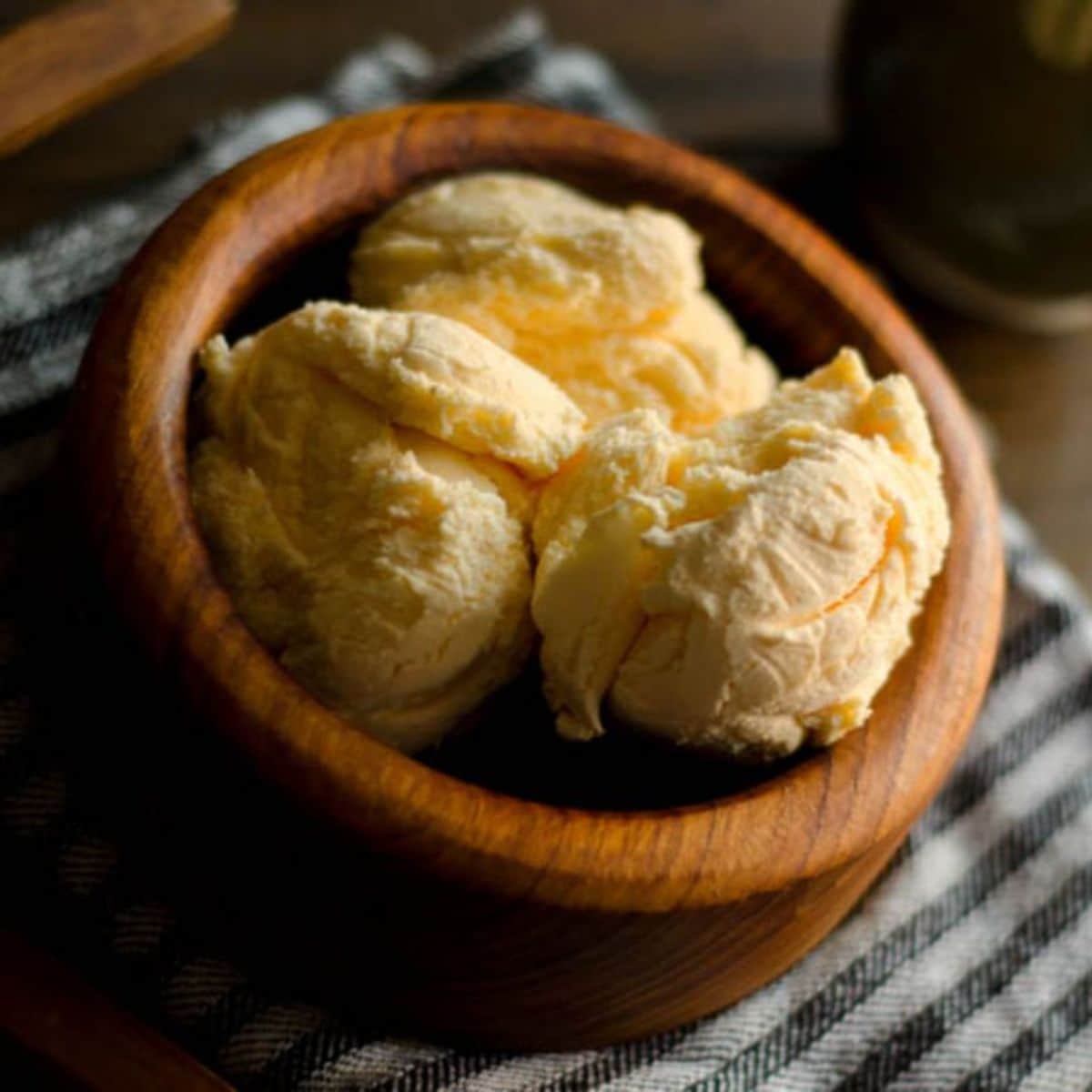 Coconut ice cream in a wooden bowl