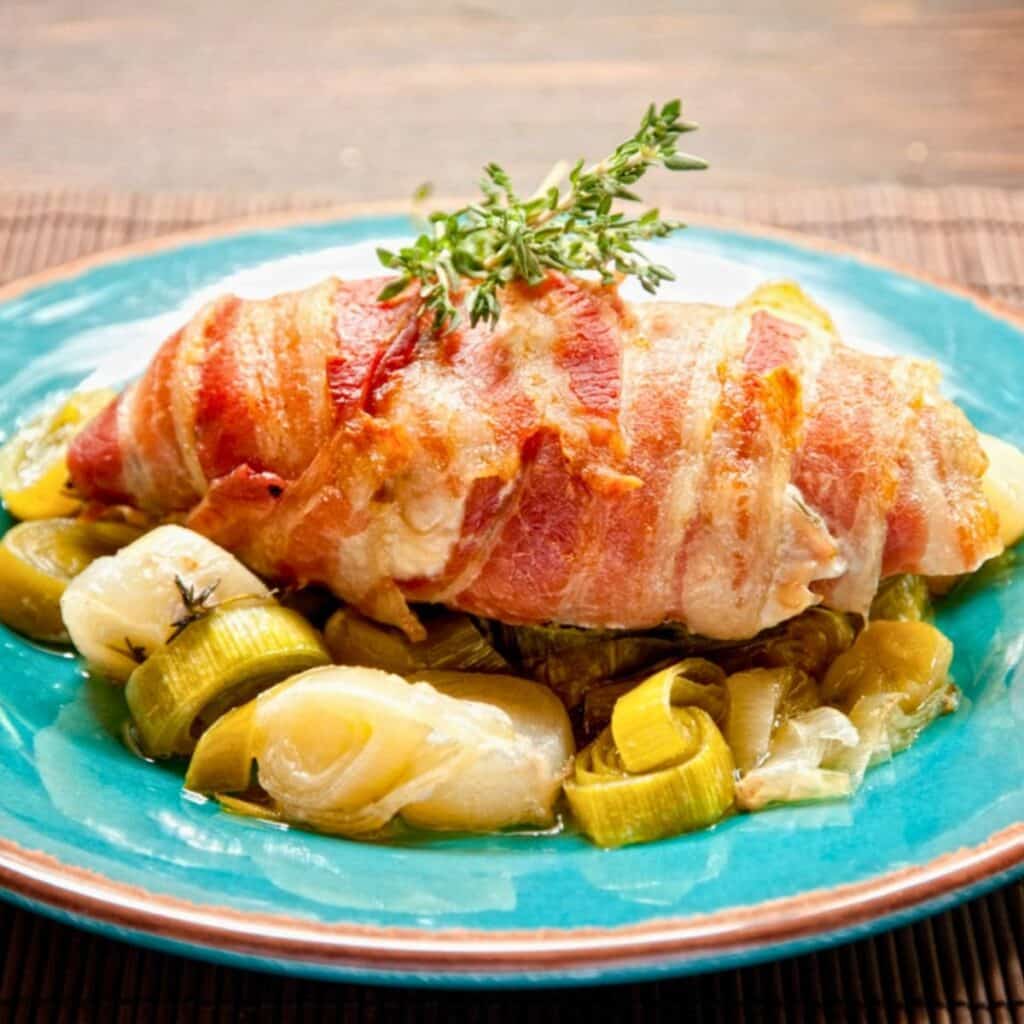 Roasted Chicken Breasts Wrapped In Bacon With Leeks Quick And Easy Paleo