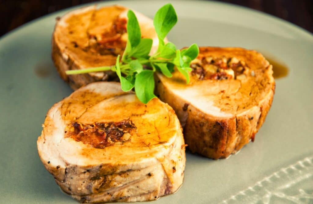 Stuffed Pork Medallions with Tomato, Oregano, and Pine Nuts