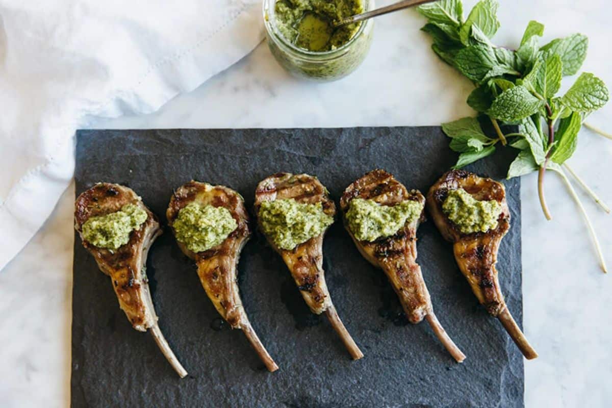 https://paleoleap.com/wp-content/uploads/2023/03/downshiftology-rosemary-grilled-lamb-chops-with-mint-apple-sauce.jpg