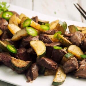 rectangle plate filled with Asian Beef Heart Stir-Fry