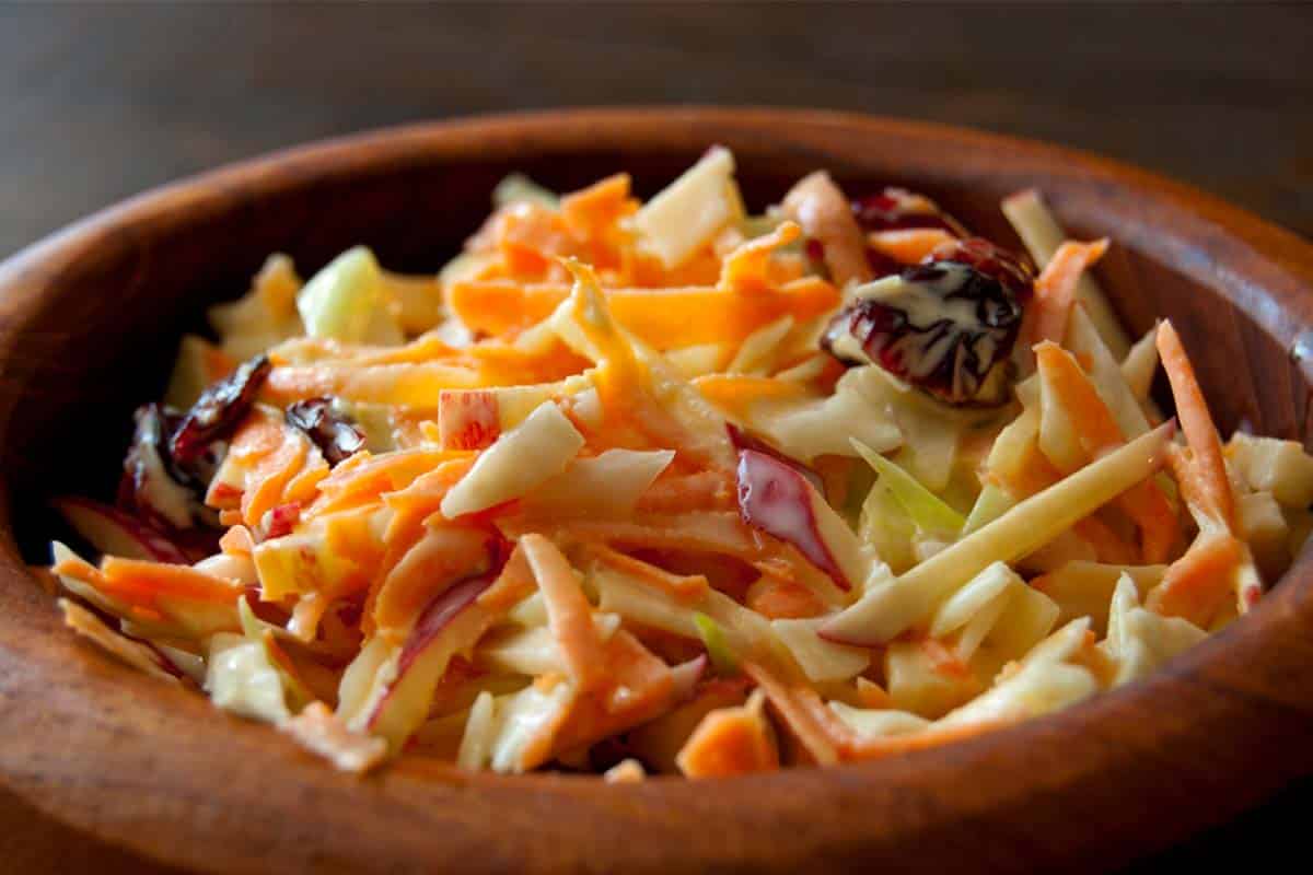bowl of Cranberry and Apple Coleslaw on a table