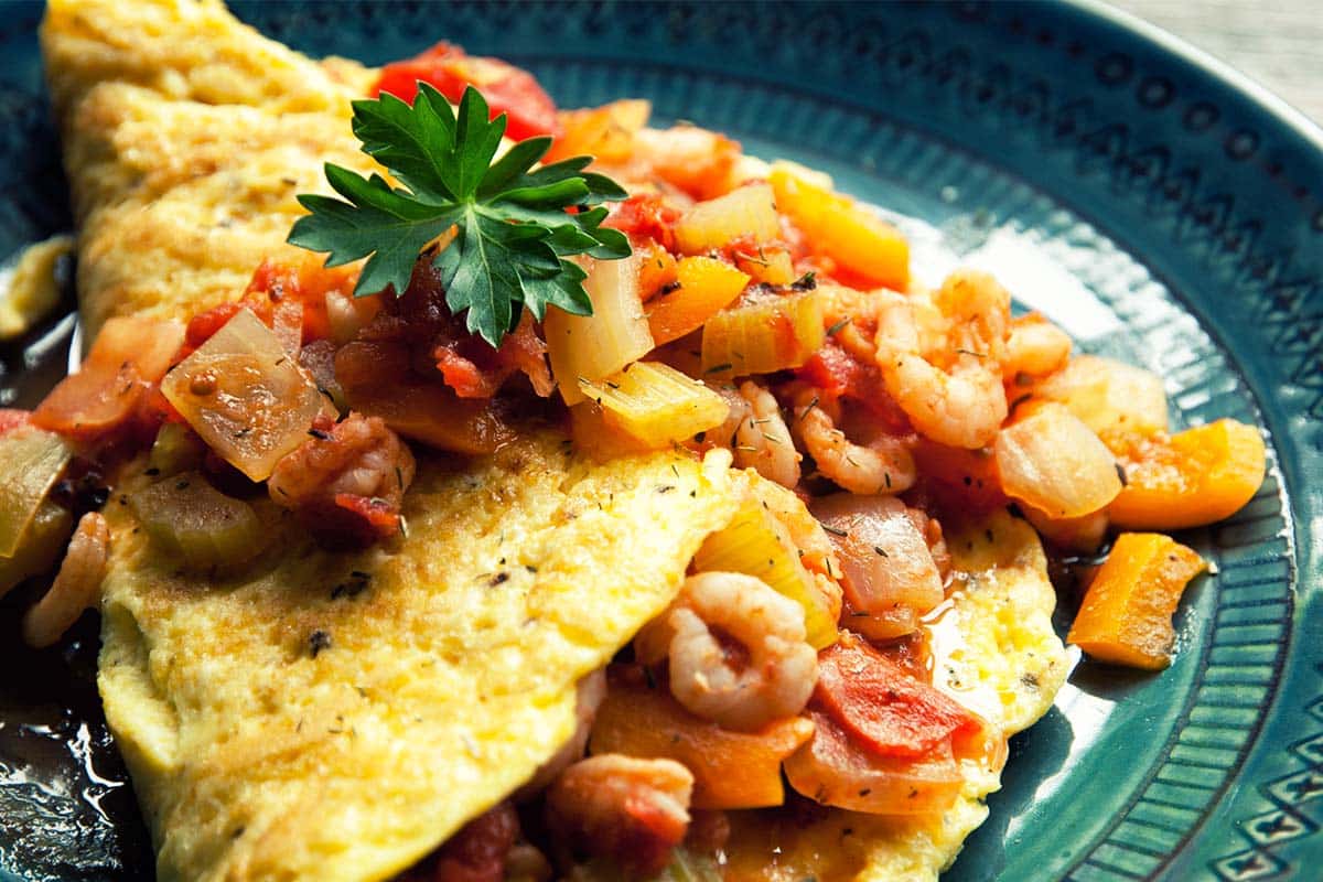 Creole omelet on a green plate