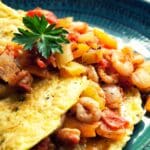 Creole omelet on a green plate