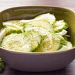 white bowl filled with cucumber fennel salad