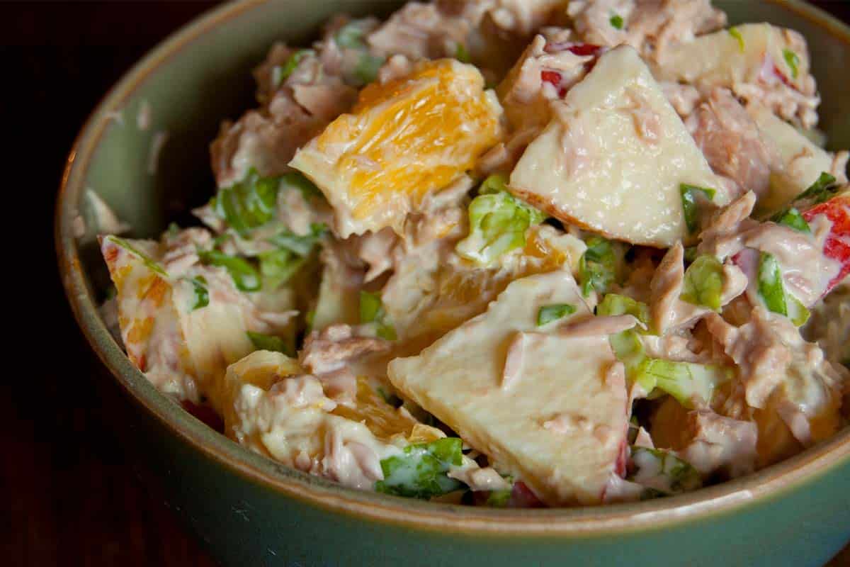 bowl filled with Tuna Salad made with Apple and Orange