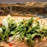 easy thai-inspired steamed trout dish on a piece of foil