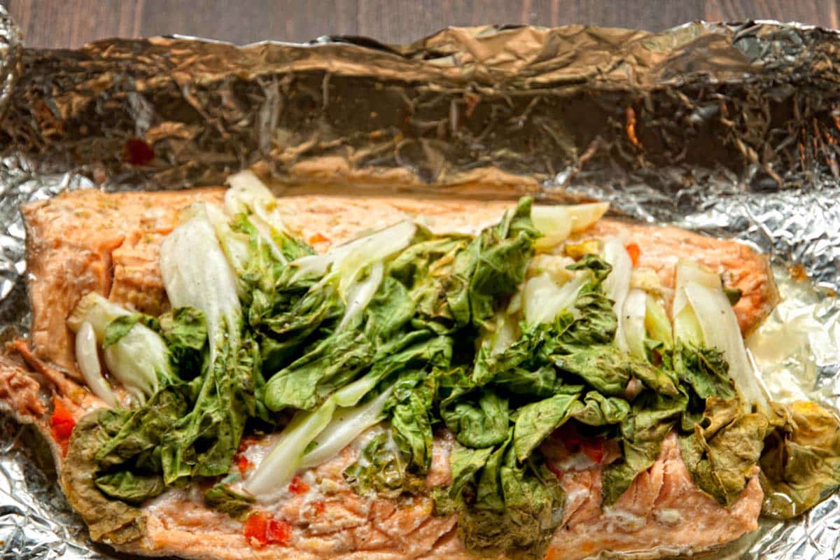 easy thai-inspired steamed trout dish on a piece of foil