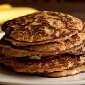 closeup of Almond banana pancakes on a white plate