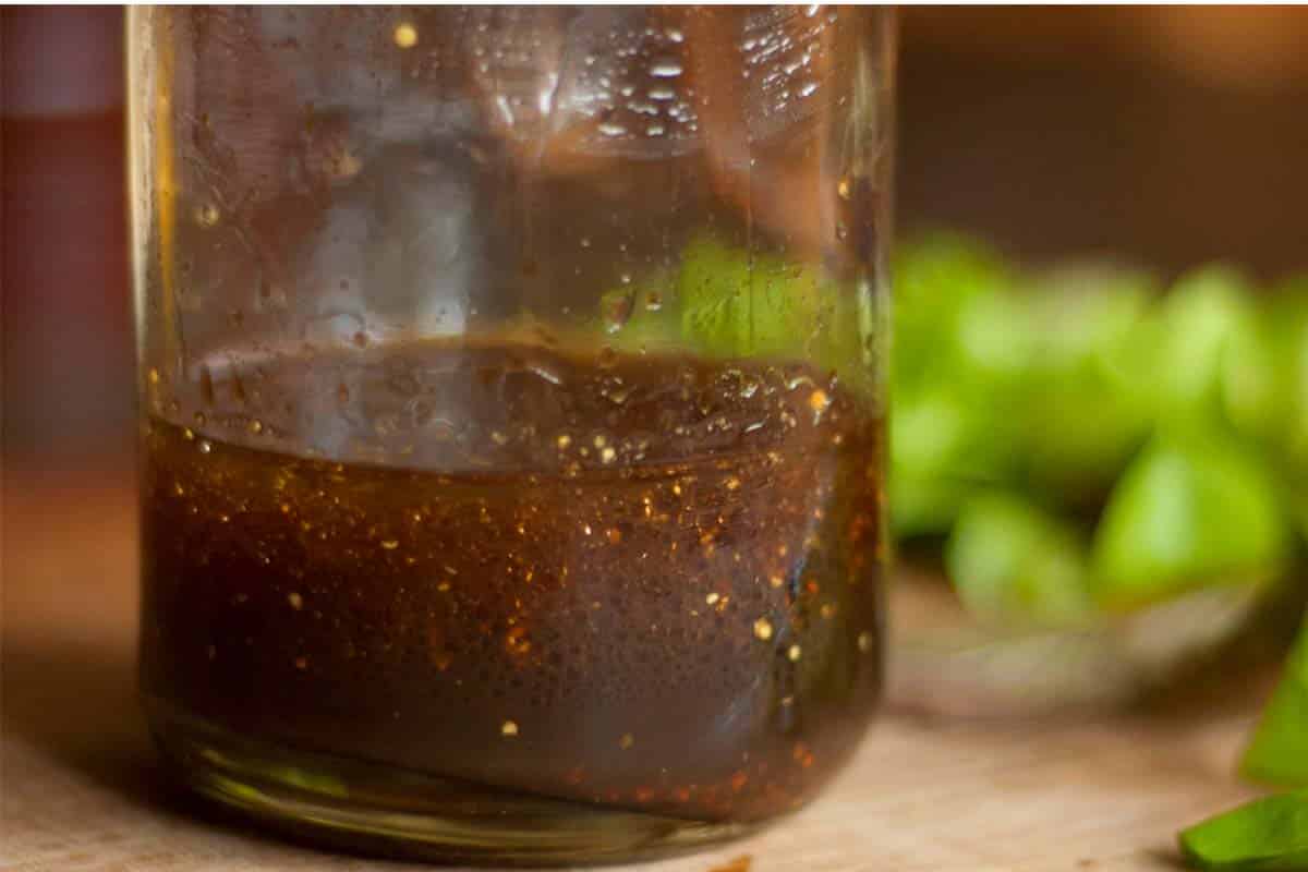 Balsamic vinaigrette in a glass carafe