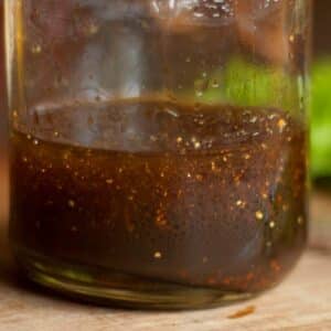 closeup of homemade Balsamic vinaigrette in a glass carafe