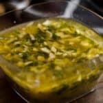 closeup of a square glass bowl filled with Brazilian chicken marinade