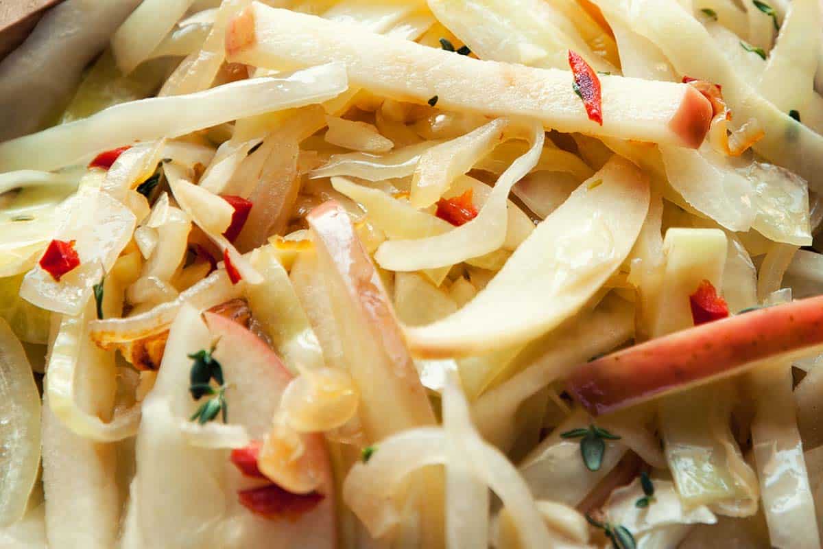 closeup of simple stir-fry made with cabbage and apples